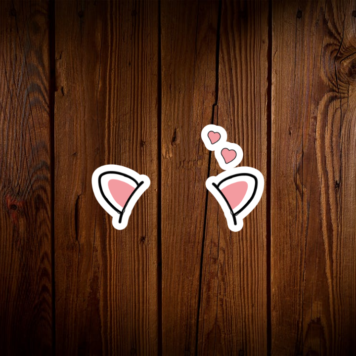 Thiết kế đôi tai mèo này mang đến một cảm giác vô cùng ngọt ngào và đáng yêu. Đôi tai được vẽ với đường nét mềm mại, tròn trịa, phần trong tai có màu hồng nhạt, phần ngoài viền đen tạo nên sự tương phản nhẹ nhàng. Đặc biệt, hai trái tim nhỏ xinh ở phía trên đôi tai càng làm tăng thêm vẻ đáng yêu, thể hiện sự thích thú và hạnh phúc. Thiết kế này đơn giản nhưng lại rất hiệu quả trong việc truyền tải cảm xúc, phù hợp với nhiều đối tượng, đặc biệt là các bạn trẻ yêu thích phong cách dễ thương, ngây thơ.